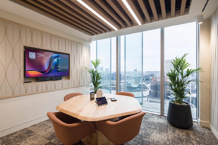 s8_50 - Furniture in muted terracotta and acoustic wall panelling.jpg